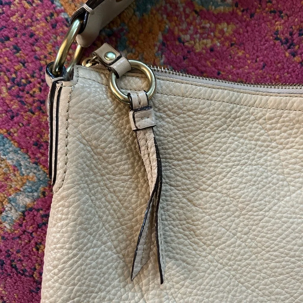 Coach | Women’s cream pebbled leather round bottom over the shoulder purse, OS